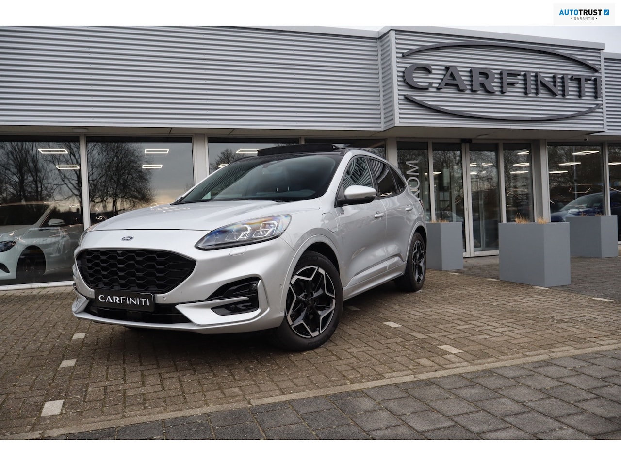 Ford Kuga - 2.5 PHEV ST-Line 225 Pk / Panoramadak, Climate / Cruise / Camera / B&O / Trekhaak / 19". - AutoWereld.nl