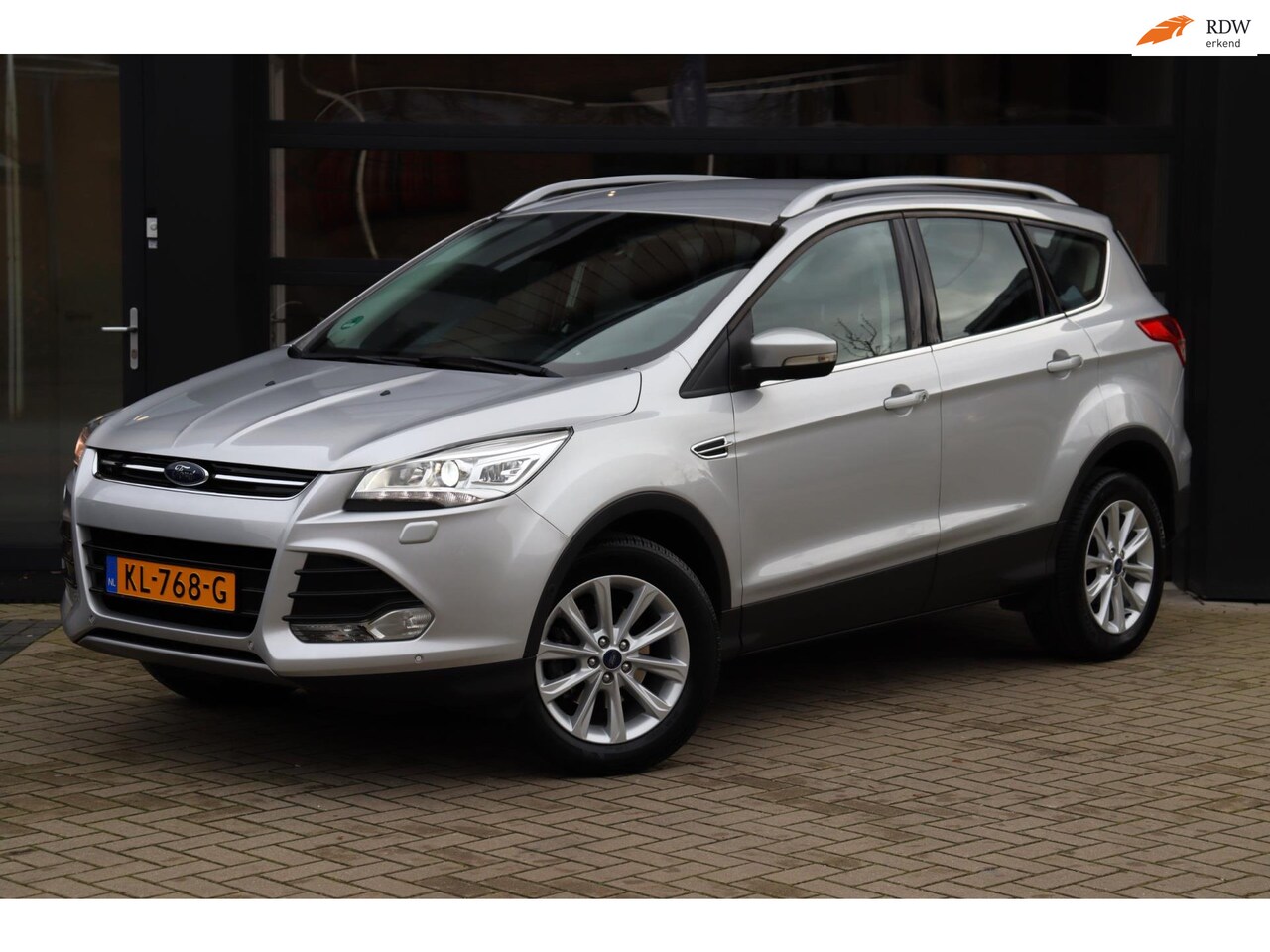 Ford Kuga - 1.5 Titanium | NAP | Eerste Eigenaar | Xenon | Stoelverwarming | Navi | Camera | Climate C - AutoWereld.nl
