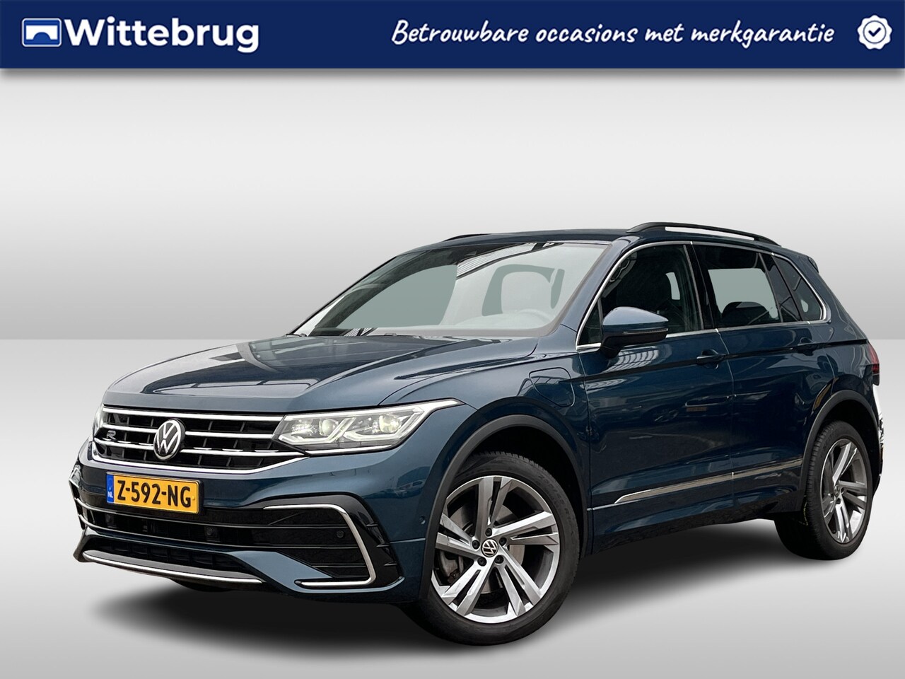 Volkswagen Tiguan - 1.4 TSI eHybrid R-Line Business+ / Pano / Head-up / Camera / Parkeersensoren V+A / Navigat - AutoWereld.nl