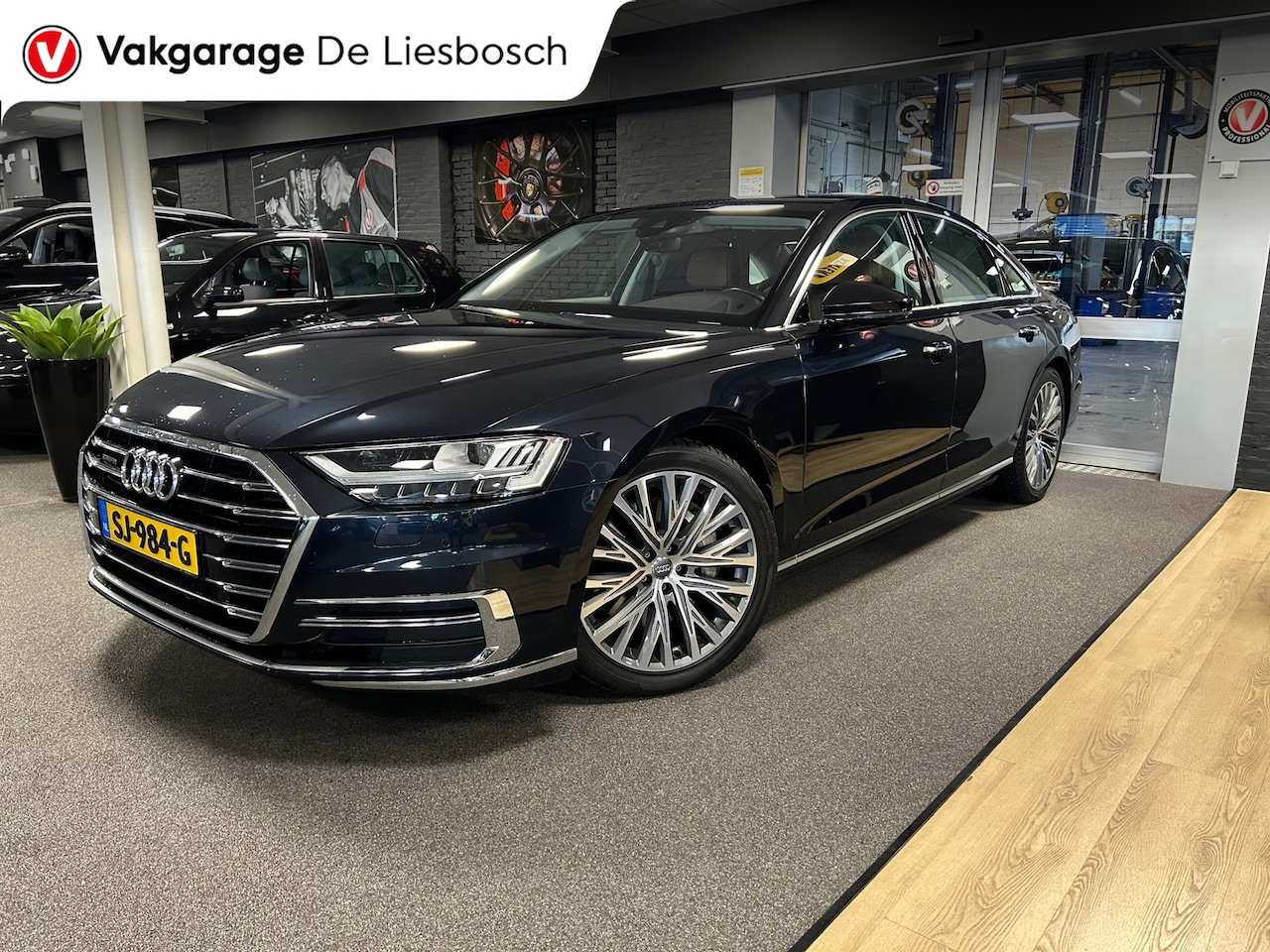 Audi A8 - 55 TFSI quattro / Leder / Navigatie / 20inch / B&O / stoel verwarming voor + achter. - AutoWereld.nl