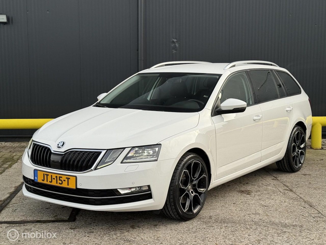 Skoda Octavia Combi - 1.8 TSI Style | Automaat | Navi | PDC | - AutoWereld.nl