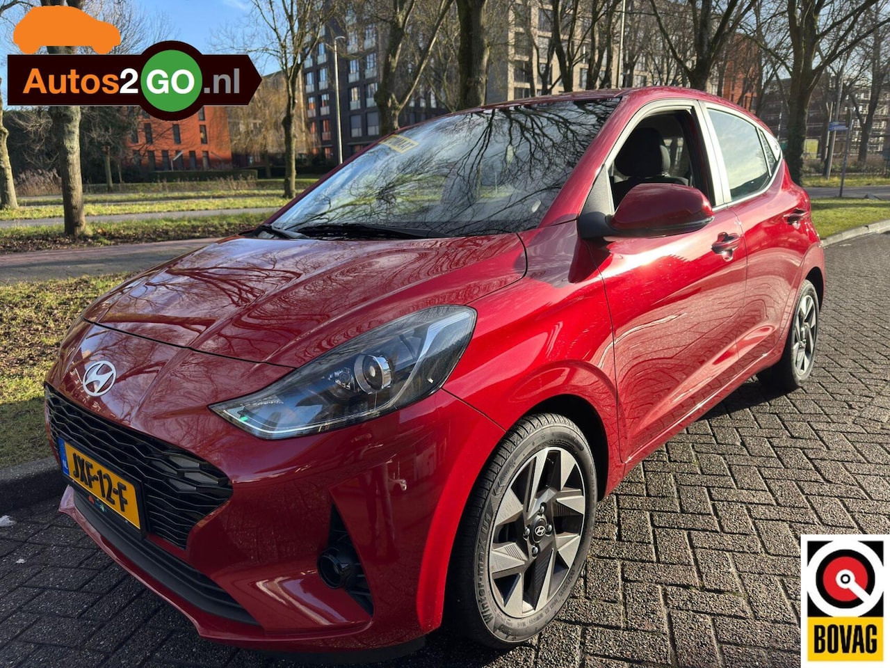 Hyundai i10 - 1.2i Automaat I Navi I AppleCarplay Android-Auto I Parkeersensoren I lane dept. I rijklaar - AutoWereld.nl