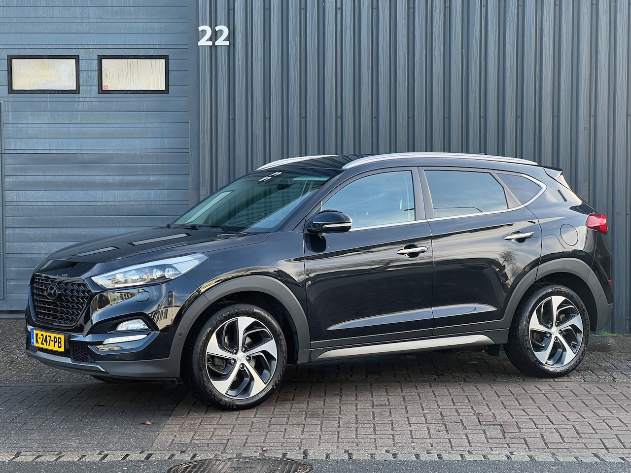 Hyundai Tucson - 1.6 T-GDi Premium 4WD|Stage 1 Chipt 213Pk|Camera|Navi|Leder|Trekhaak|Goed Onderh - AutoWereld.nl