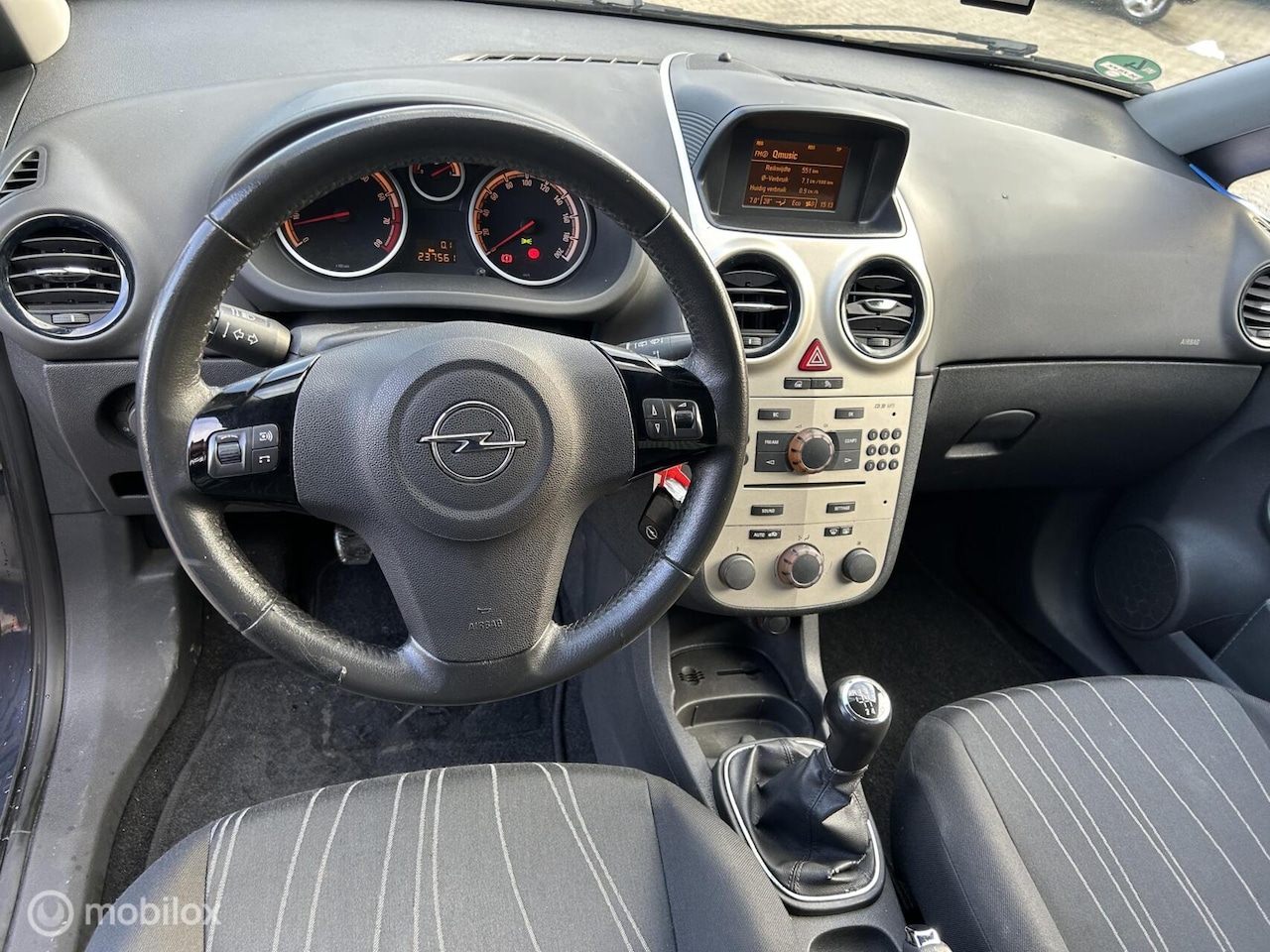 Opel Corsa - 1.4-16V Enjoy 1.4-16V Enjoy - AutoWereld.nl