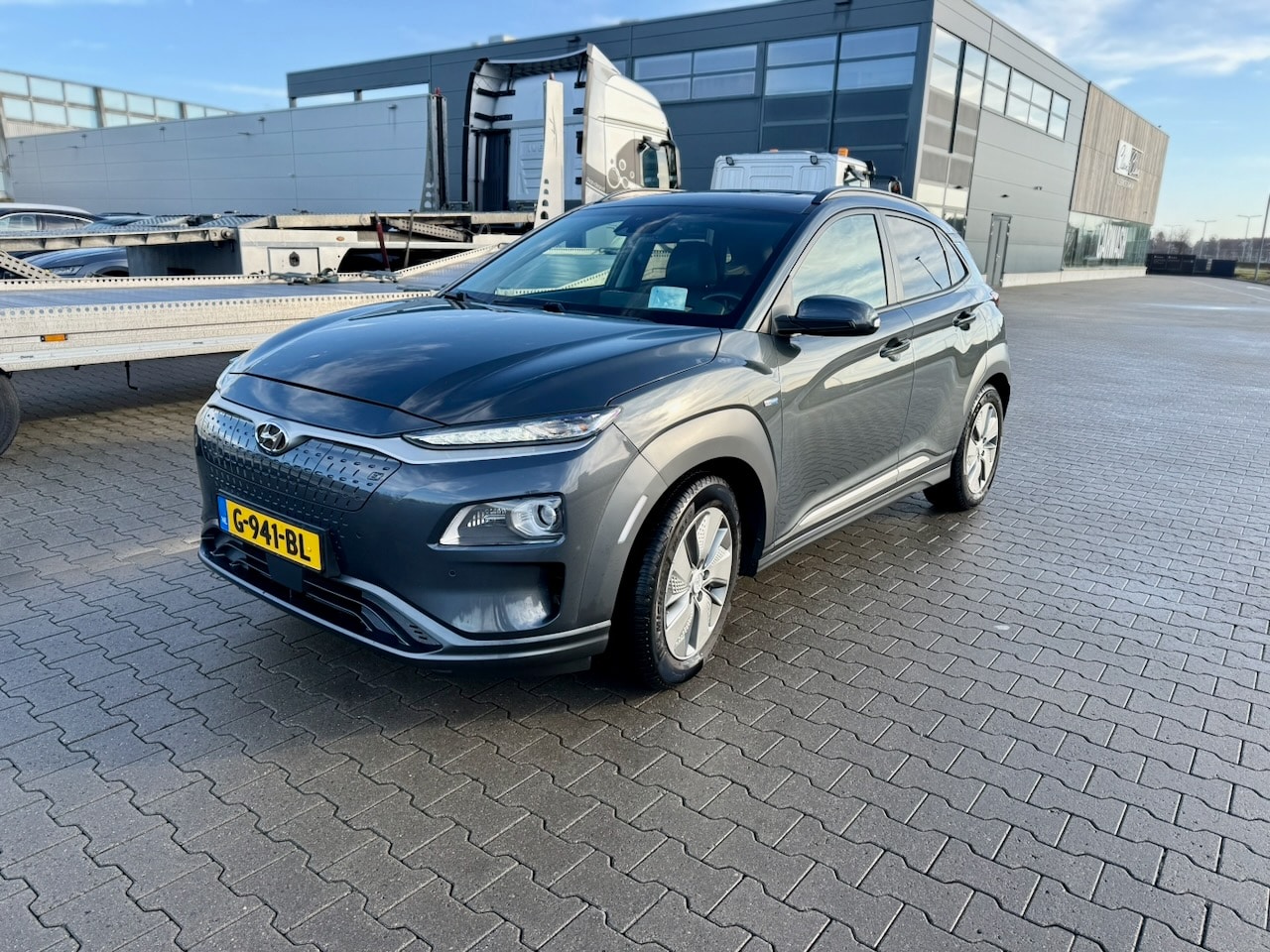 Hyundai Kona - EV Premium 64 kWh Premium Sky 64 kWh | Schuifdak | HUD | 1ste eigenaar | Actieradius 450km - AutoWereld.nl