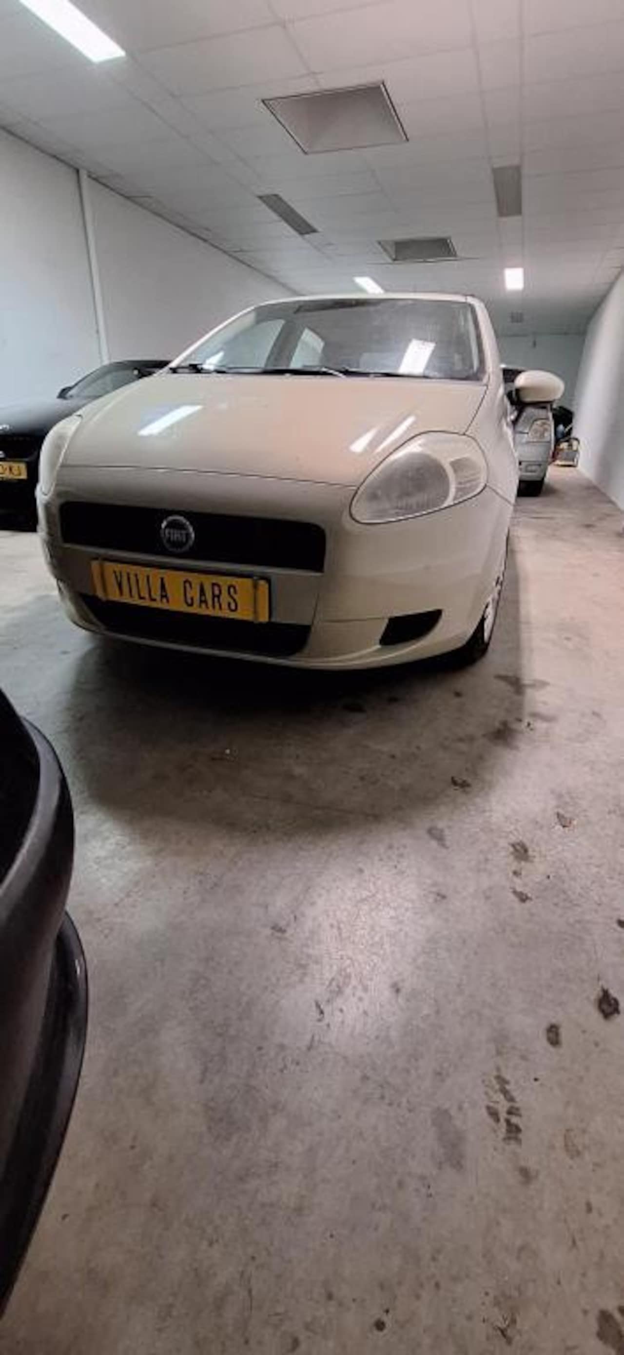 Fiat Grande Punto - 1.2 Edizione Cool Design Giugiaro - AutoWereld.nl