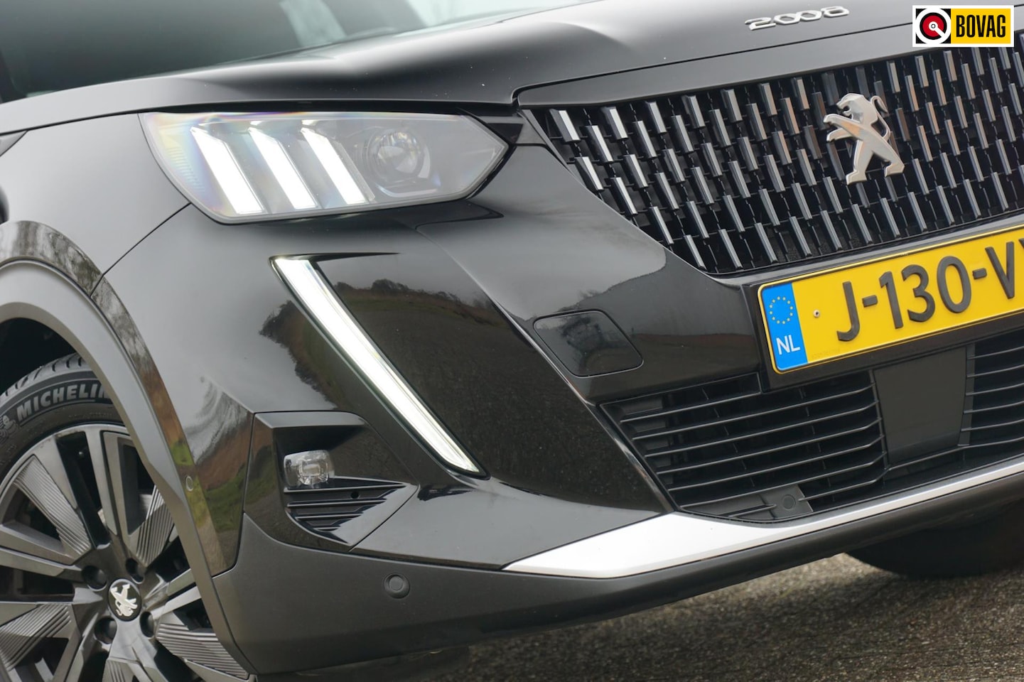Peugeot 2008 - 1.2 PT GT-Line | Noir Perla Nera | AppleCarplay/Nav/Cruise/Stoelverwarming/Camera - Sporti - AutoWereld.nl