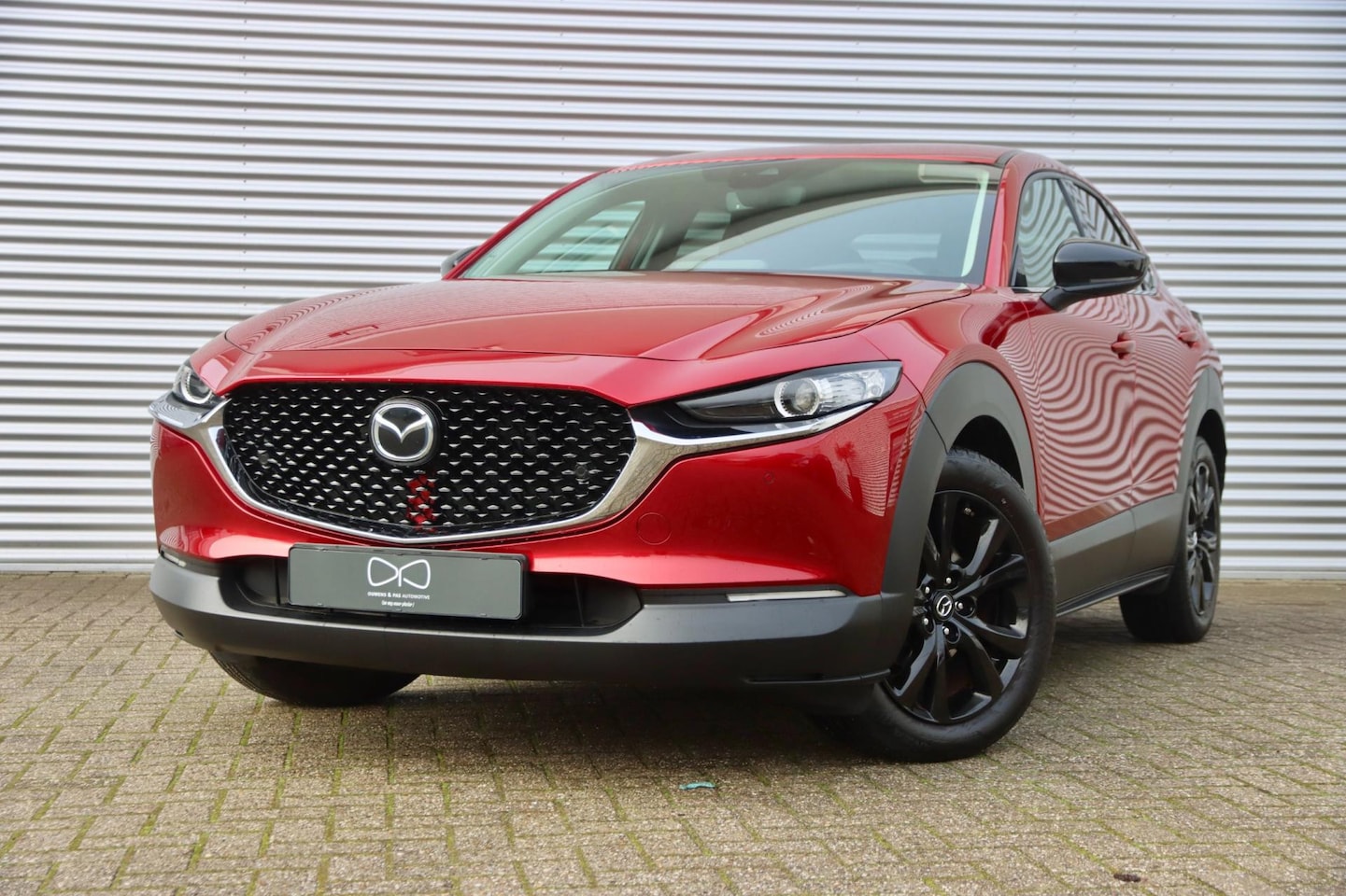 Mazda CX-30 - 2.0 e-SkyActiv-G M Hybrid | 1E EIGENAAR | NAVIGATIE | STOELVERWARMING | SOUL CRYSTAL RED - AutoWereld.nl