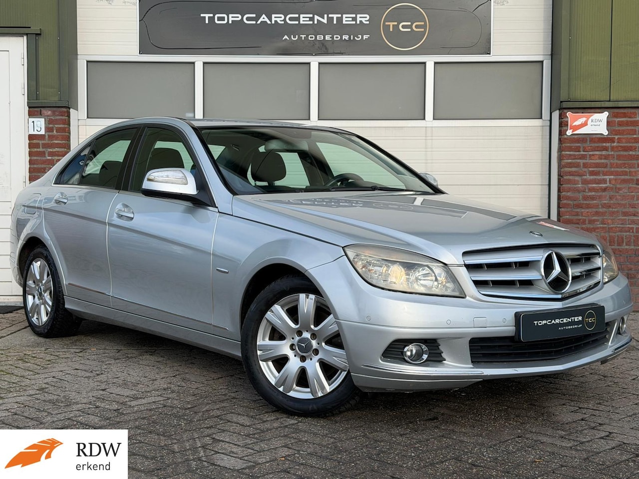 Mercedes-Benz C-klasse - 200 K Elegance/AIRCO/PARKS/NAVI/CRUISE/APK - AutoWereld.nl