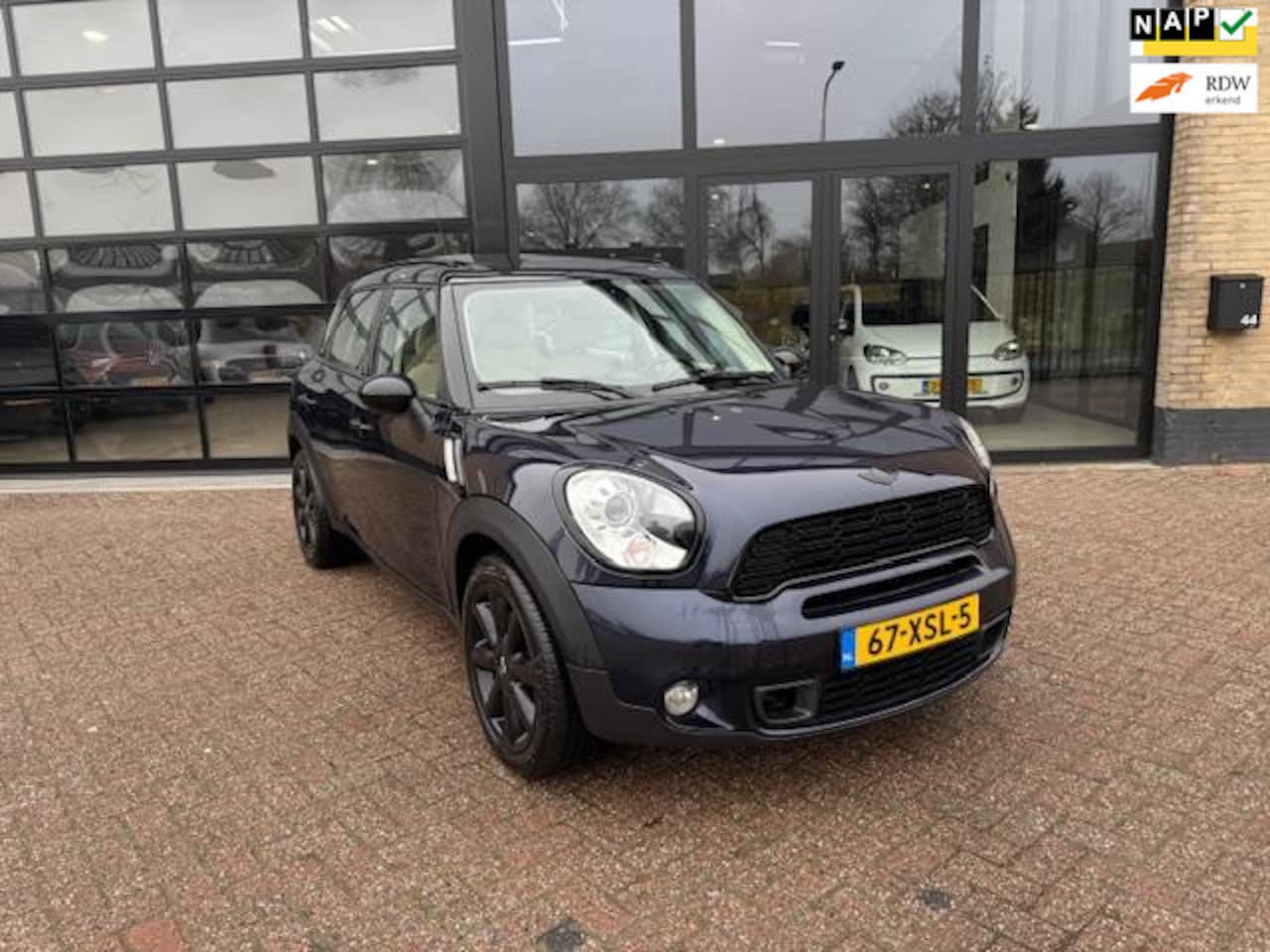 MINI Countryman - 1.6 Cooper S ALL4 Chili Mini 1.6 Cooper S ALL4 Chili - pano, leder, navi - AutoWereld.nl