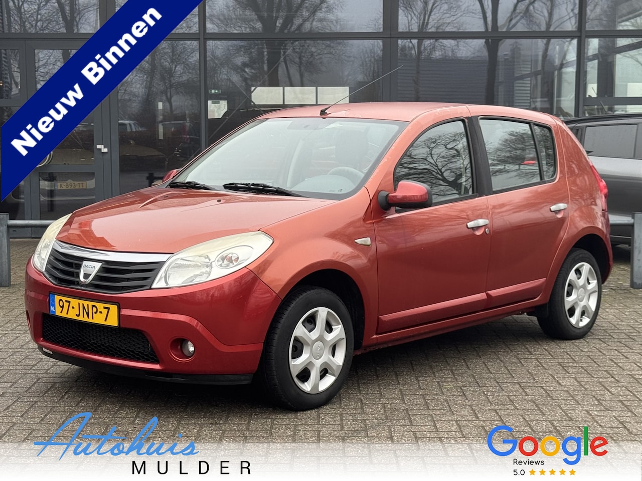 Dacia Sandero - 1.2 Lauréate Airco/Trekhaal/CV/Audio - AutoWereld.nl