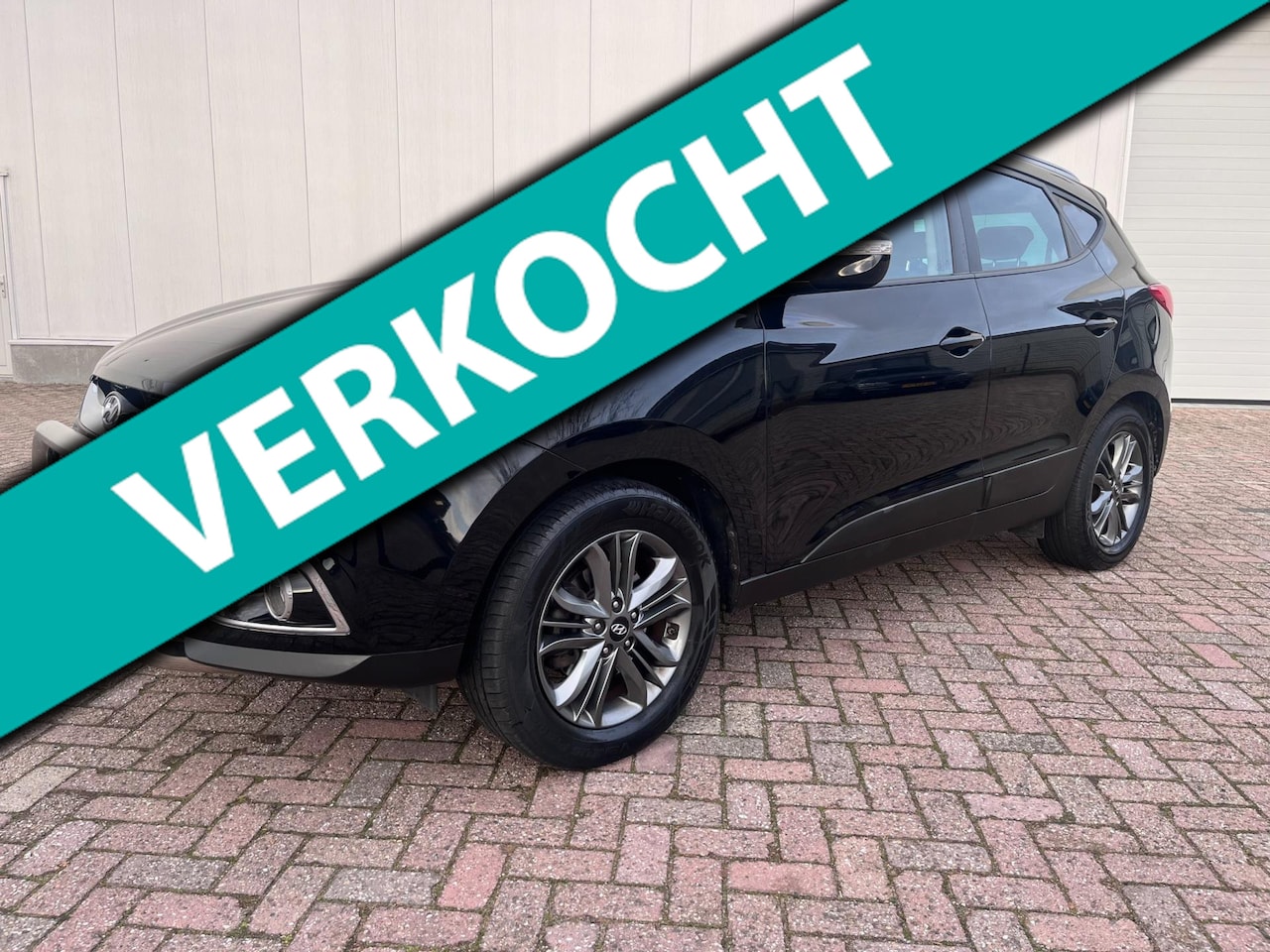Hyundai ix35 - 1.6i GDI i-Vision ECC leder trekhaak stoel verwarming 2015 - AutoWereld.nl