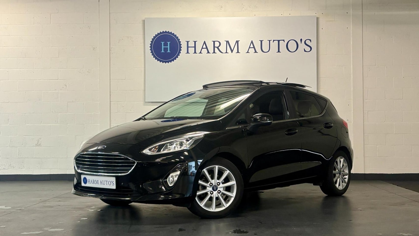 Ford Fiesta - 1.0 EcoBoost Titanium Automaat Pano / Clima / PDC / CAM - AutoWereld.nl