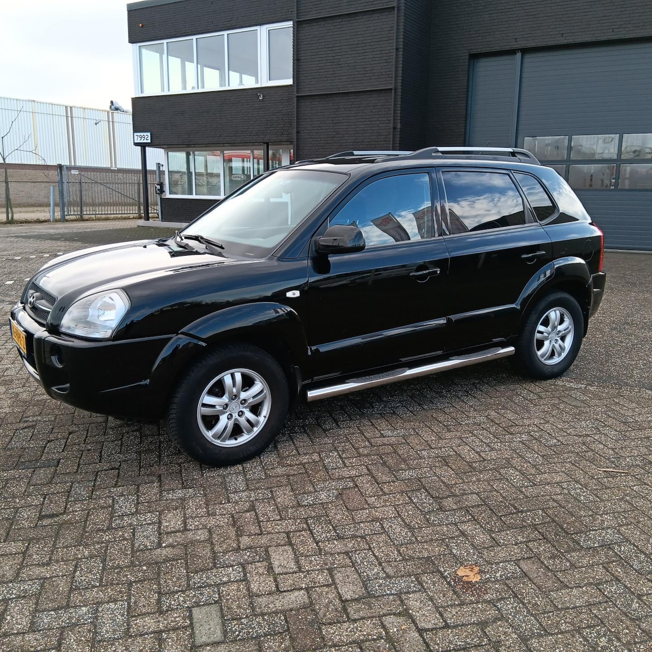 Hyundai Tucson - 2.0i Style Executive 2.0i Style Executive - AutoWereld.nl