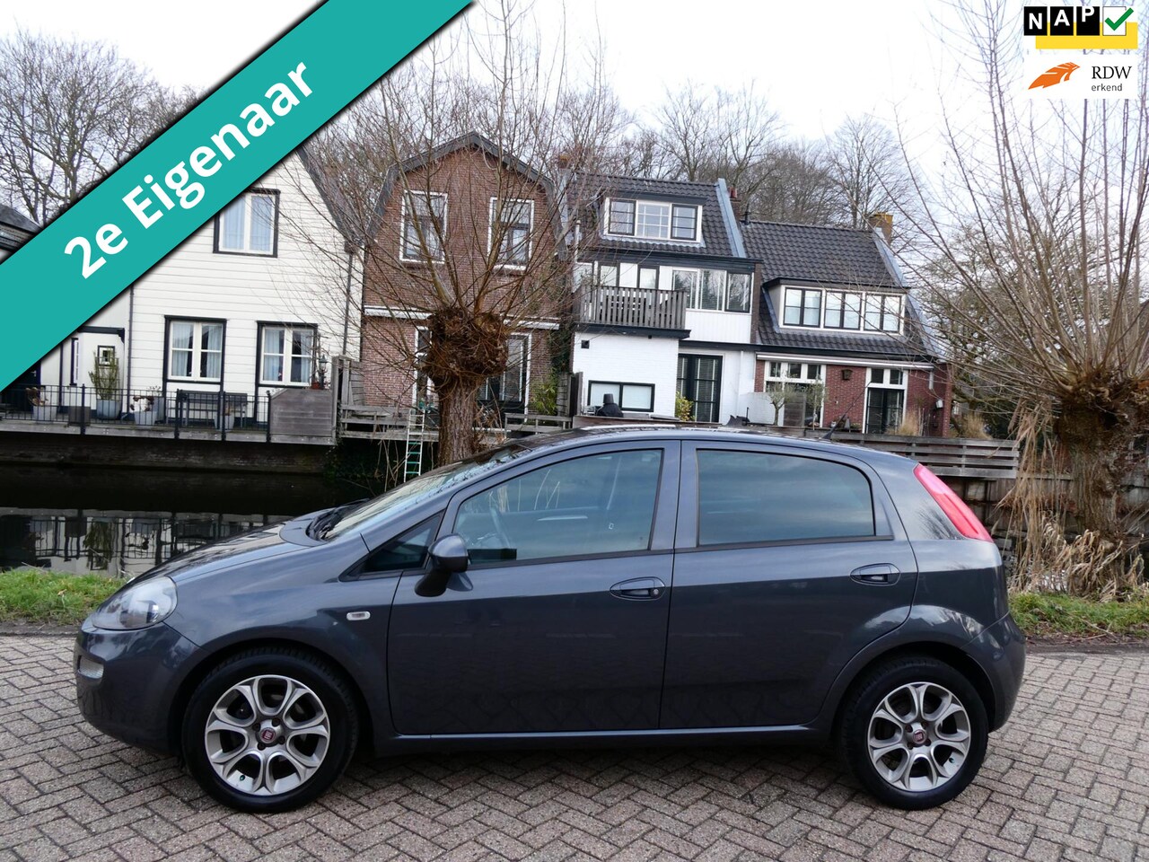 Fiat Punto Evo - 0.9 TwinAir Lounge 5-drs 2e eig. 112.000km Clima Cruise Navi - AutoWereld.nl