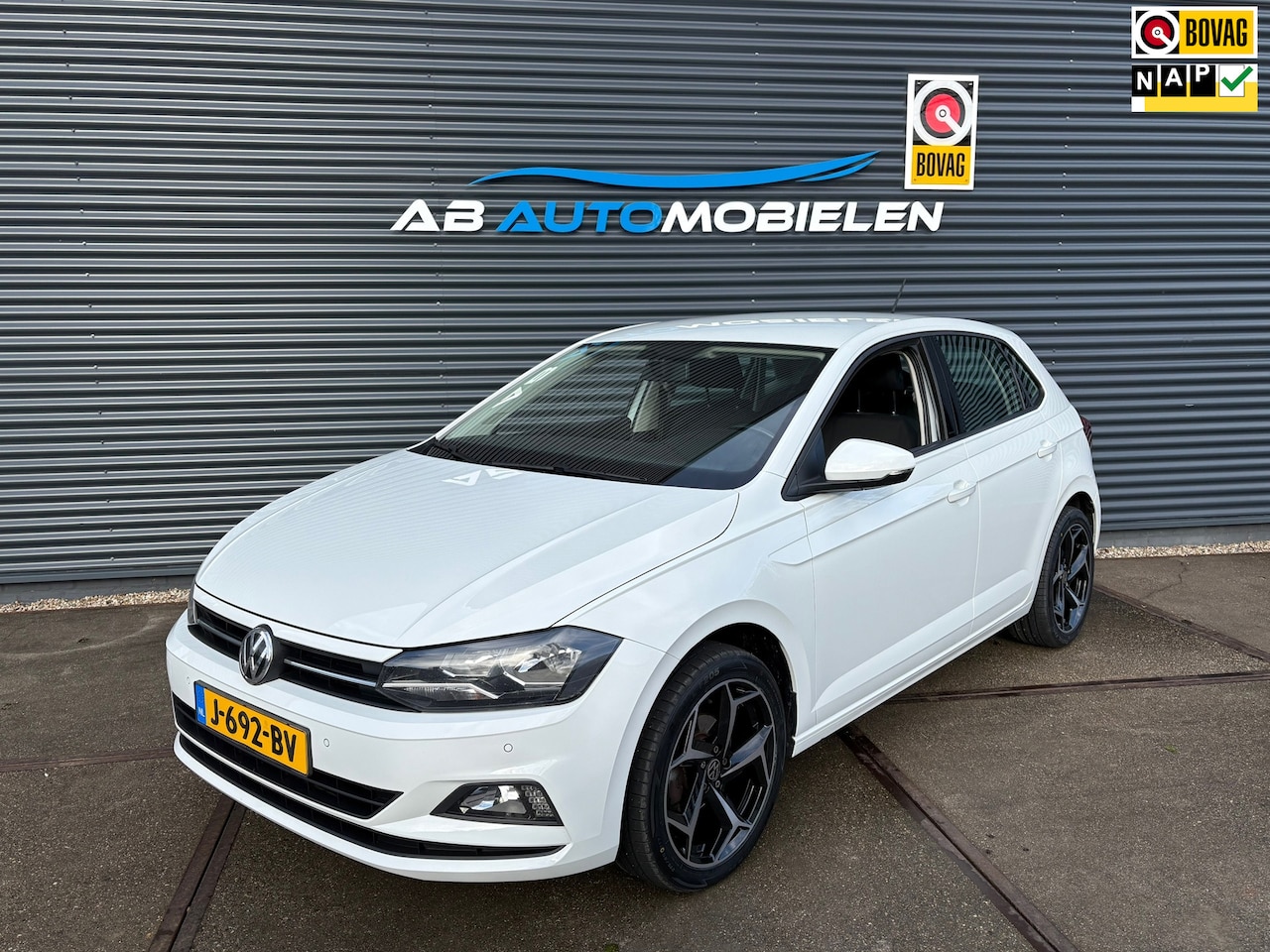 Volkswagen Polo - 1.0 TSI Comfortline NAVI / PDC/ CARPLAY - AutoWereld.nl