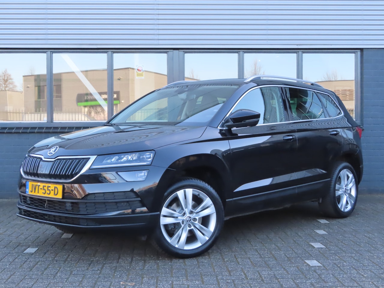 Skoda Karoq - 1.5 TSI ACT Style DSG | lederen bekleding | elektrisch verstelbare stoel + geheugen | adap - AutoWereld.nl