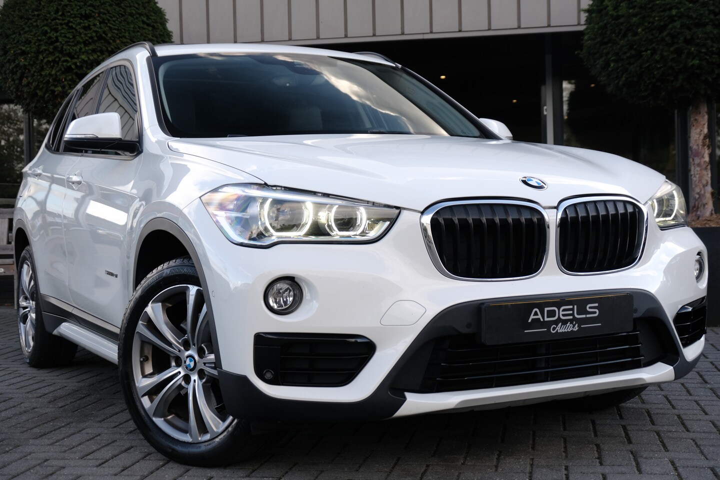 BMW X1 - sDrive18i High Executive Automaat Panodak Leder - AutoWereld.nl
