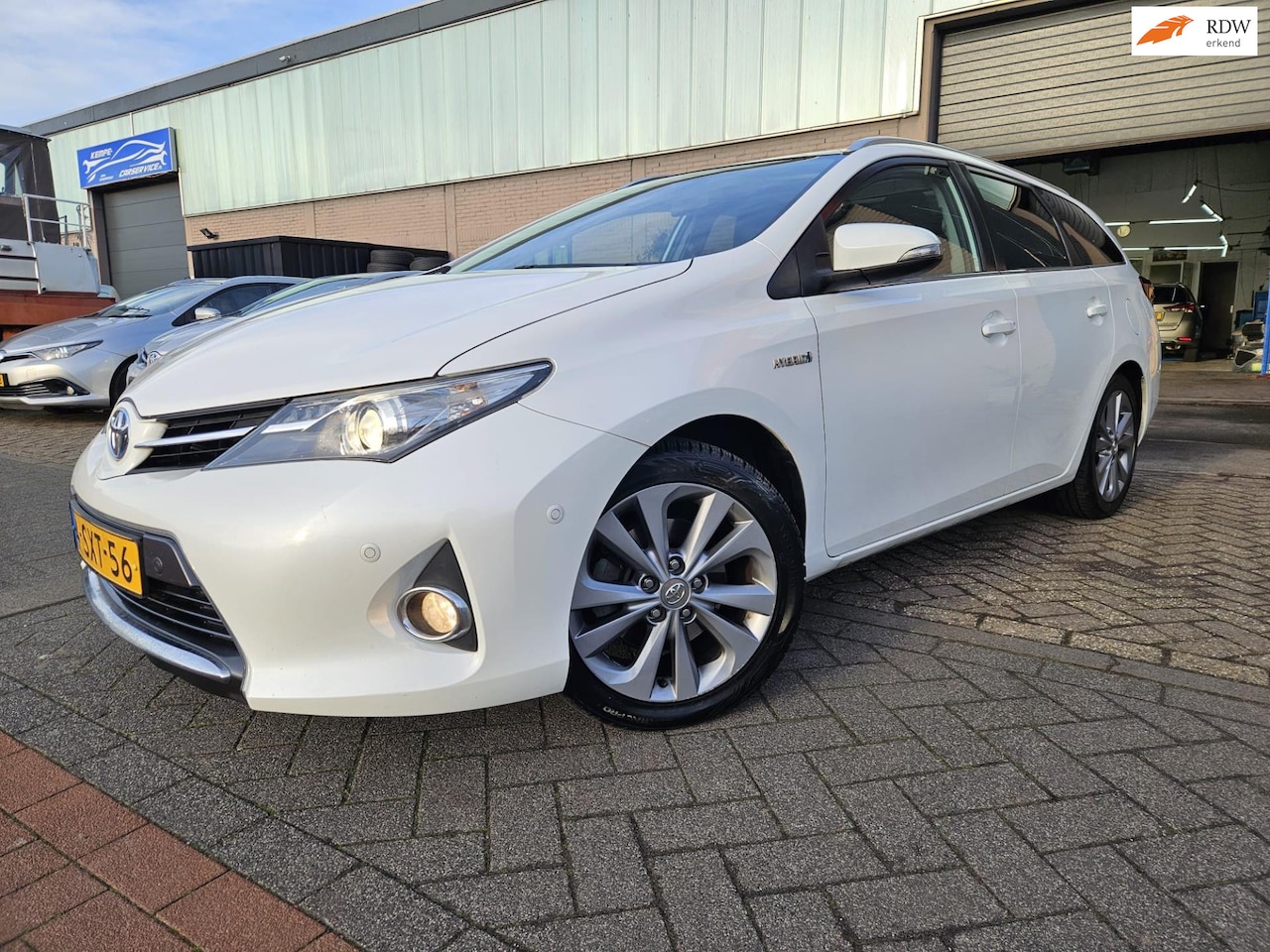 Toyota Auris Touring Sports - 1.8 Hybrid Lease Pro GARANTIE - AutoWereld.nl