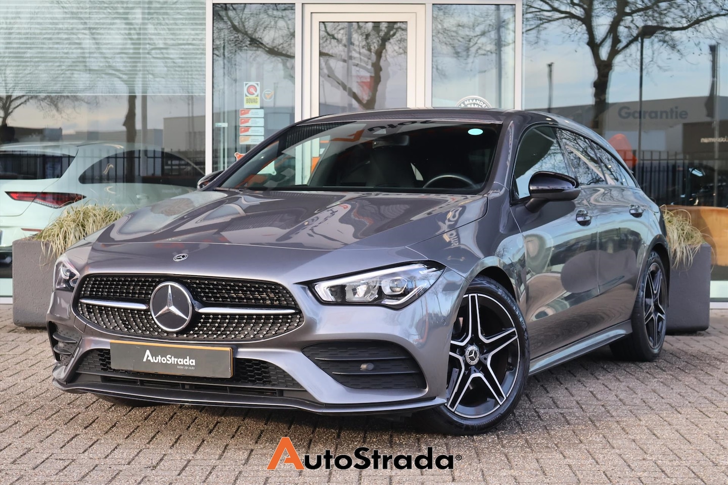Mercedes-Benz CLA-klasse Shooting Brake - 180 AMG-Line 136pk | Sfeer | Night | Climate | Cruise | LED | Stoelverwarming | Camera - AutoWereld.nl