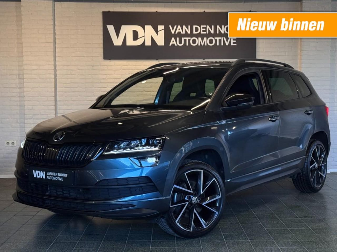 Skoda Karoq - 1.5 TSI ACT Sportline Business DSG Virtual Trekhaak Navi Stoelverw 19'' - AutoWereld.nl