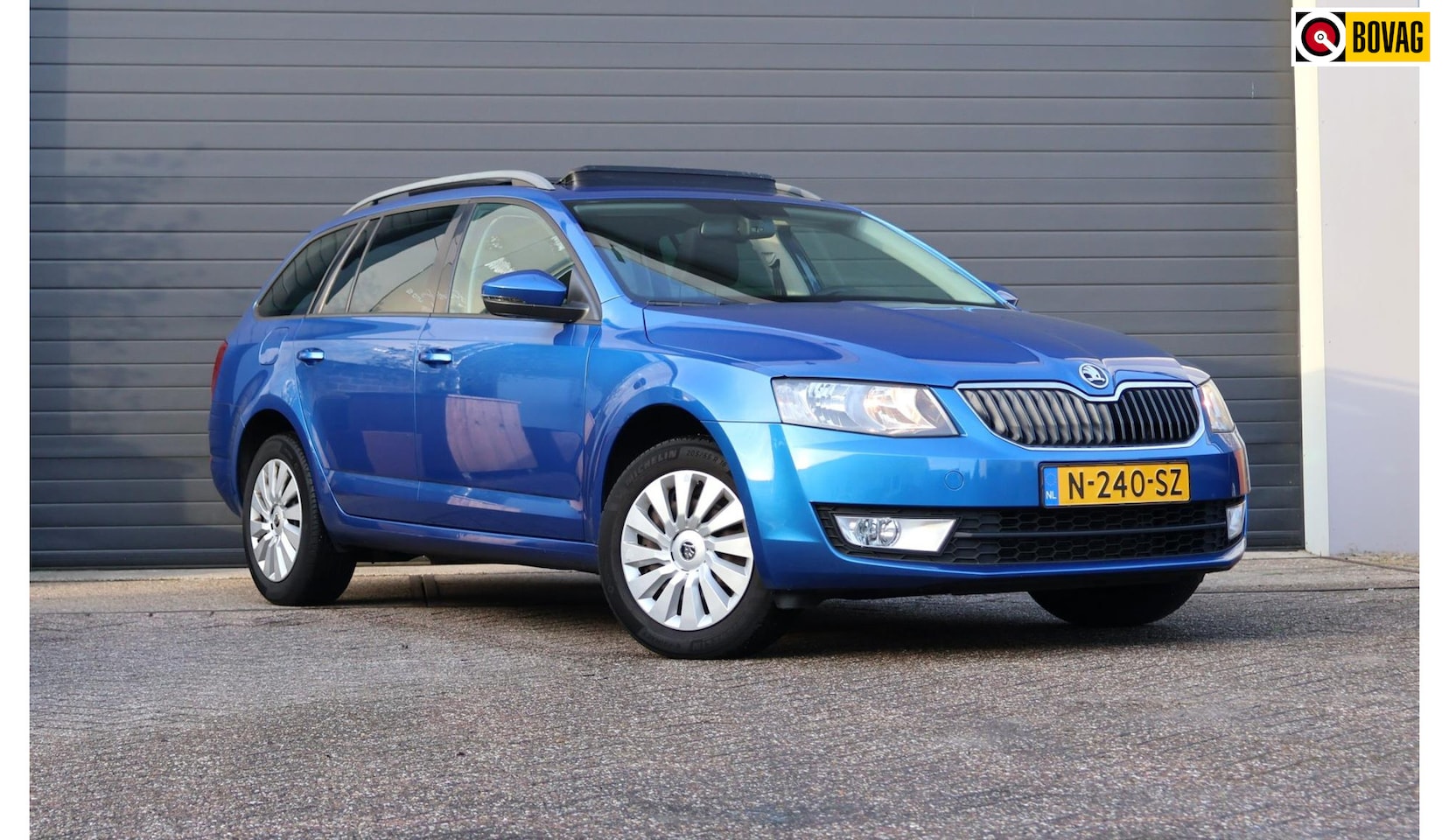 Skoda Octavia Combi - 1.6 TDI Elegance Businessline Pano/Navi/Clima/PDC - AutoWereld.nl