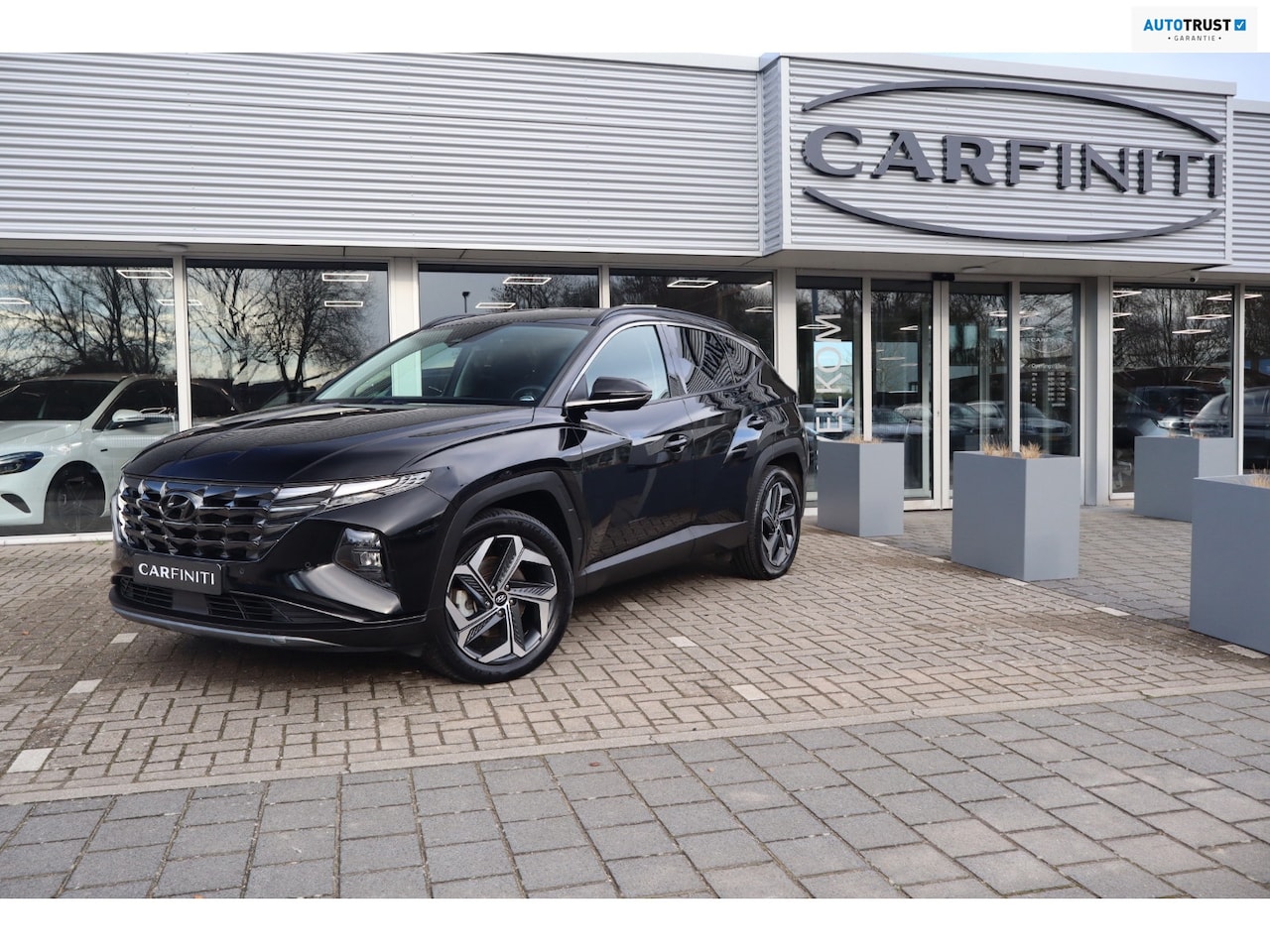 Hyundai Tucson - 1.6 T-GDI PHEV Premium 4WD 265 Pk / Automaat / Navi / Climate / Cruise / Camera . - AutoWereld.nl