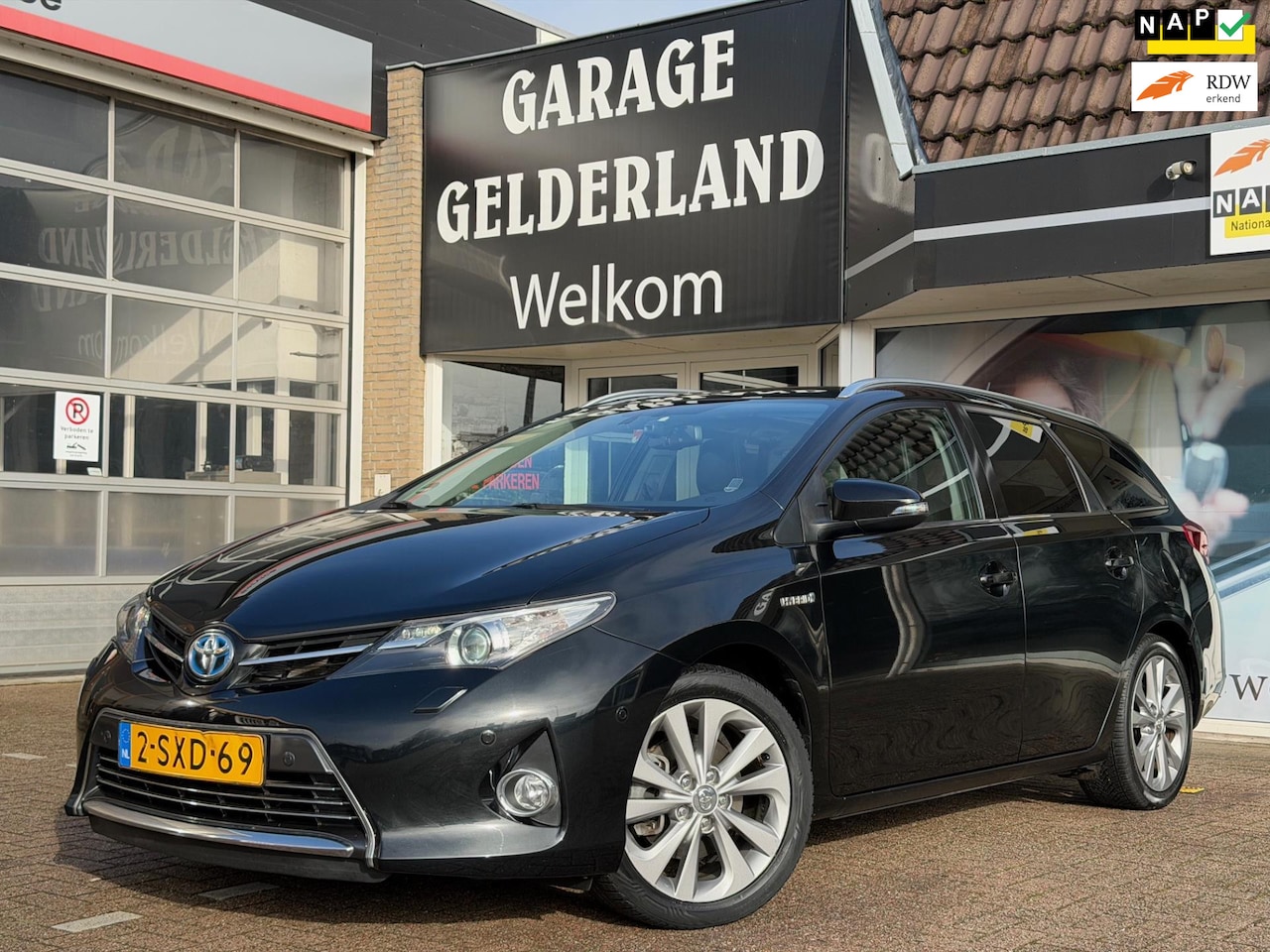 Toyota Auris Touring Sports - 1.8 Hybrid Lease Pro | Navi | Camera | Cruise | Climate | Pdc | Xenon | Iso - AutoWereld.nl