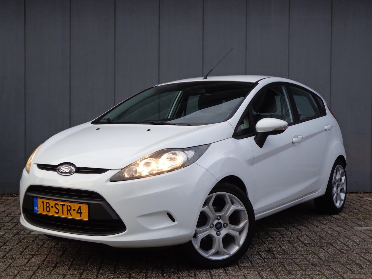 Ford Fiesta - 1.25i 16V Limited Sport Trend Top Staat,2eig. - AutoWereld.nl
