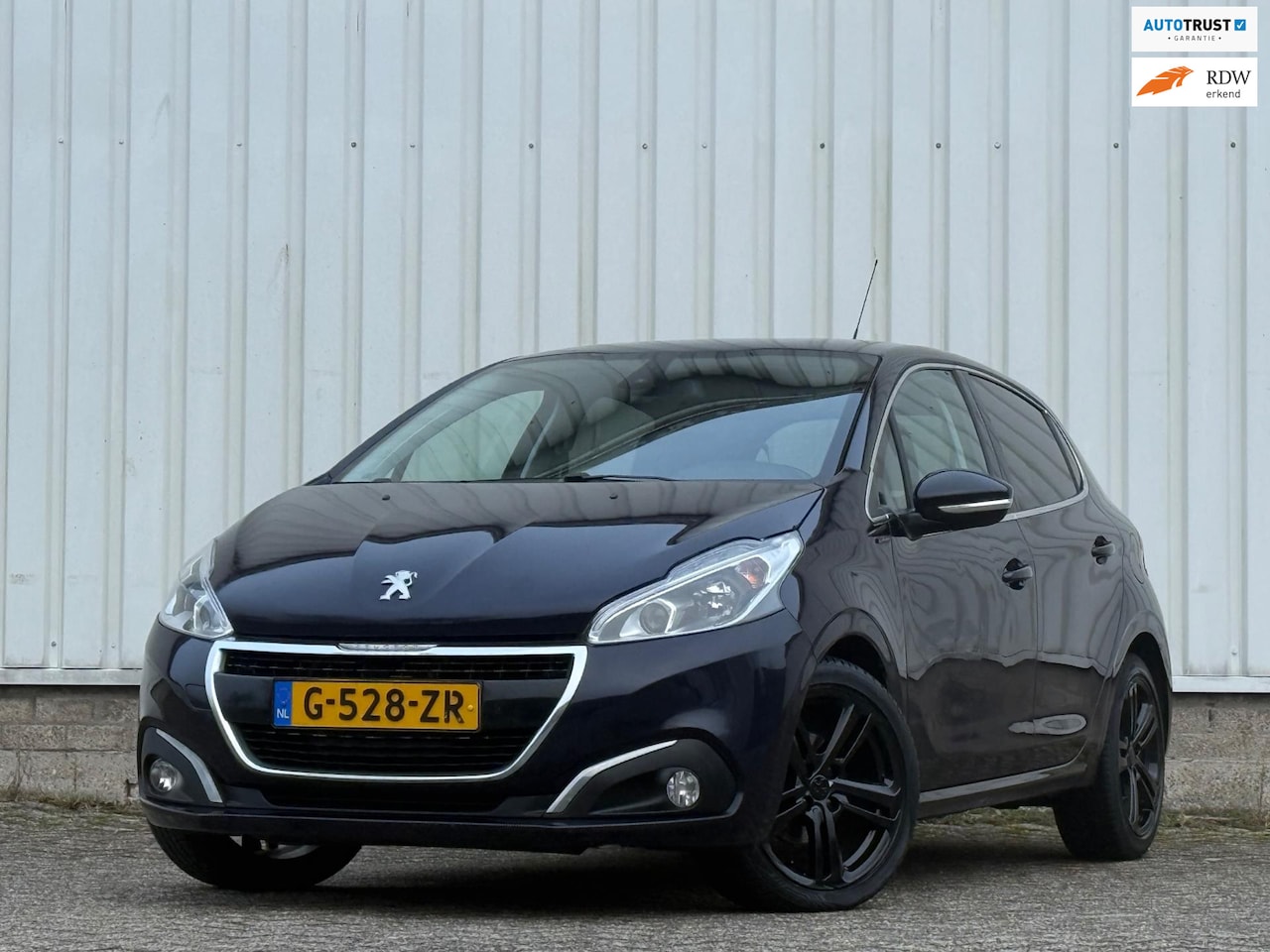 Peugeot 208 - 1.2 PureTech Roland Garros 1.2 PureTech Roland Garros,Automaat,1e Eigenaar,Climate,Navi,Camera,Cruise,PDC,Apk tot 29- - AutoWereld.nl