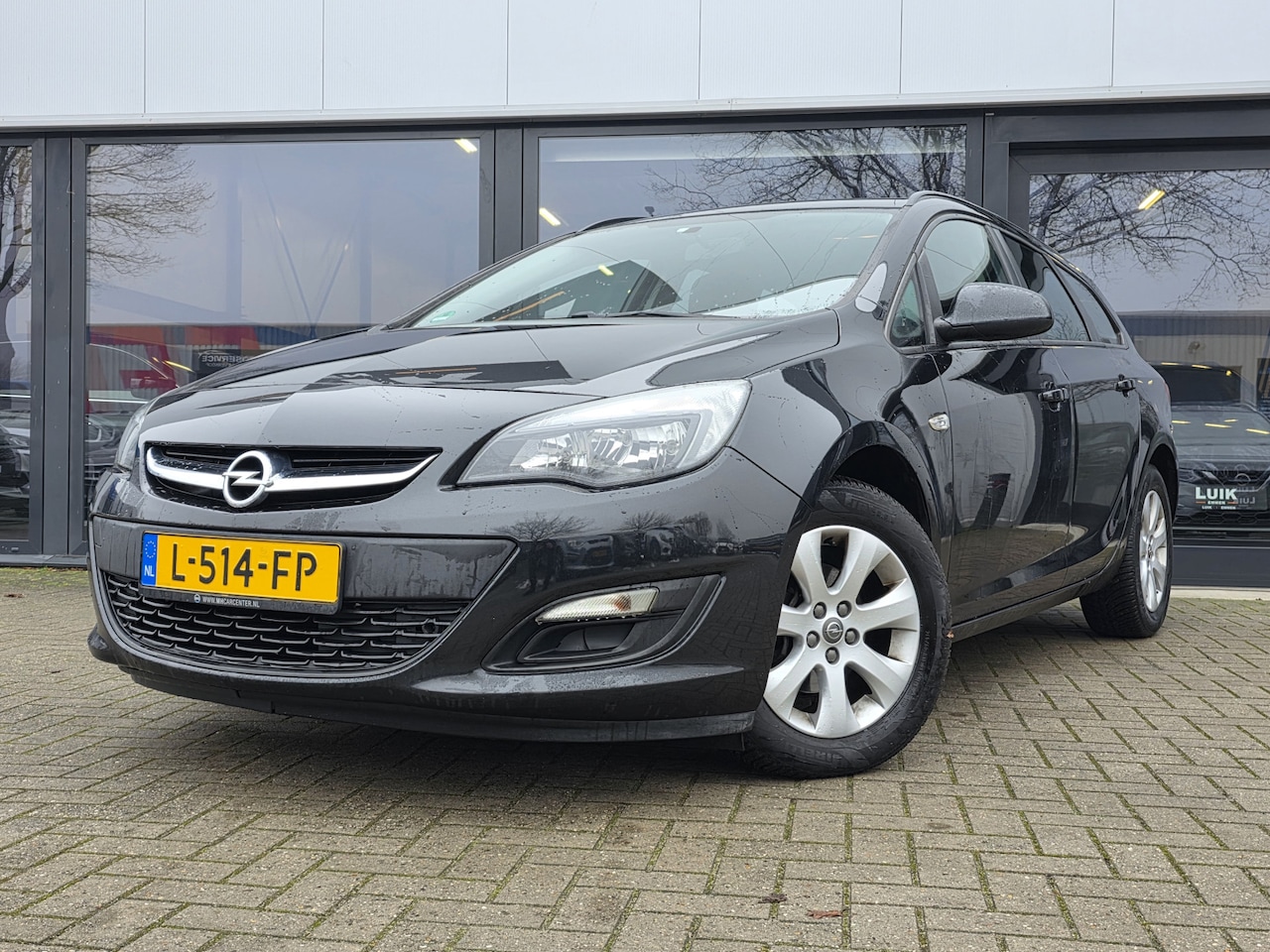 Opel Astra Sports Tourer - 1.4 Turbo Design Edition + LM VELGEN + AIRCO + CRUISE CONTROL - AutoWereld.nl