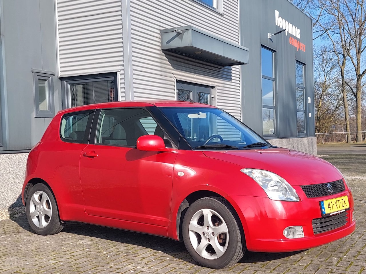 Suzuki Swift - 1.3 Exclusive airco trekhaak - AutoWereld.nl