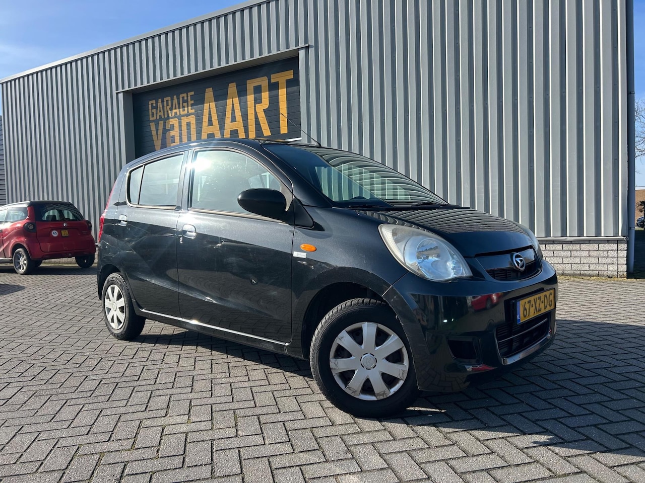 Daihatsu Cuore - 1.0 Trend | STUURBKR | APK 11-2026 | - AutoWereld.nl