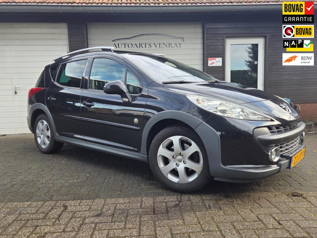 Peugeot 207 SW Outdoor - Peugeot 207 SW Outdoor 1.6 VTi XS airco panoramadak nwe apk - AutoWereld.nl