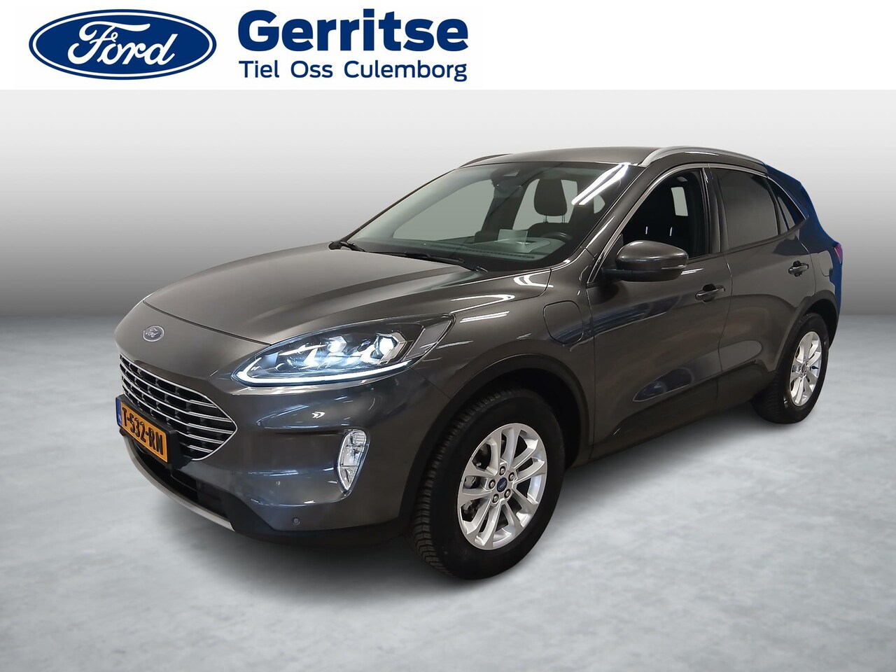 Ford Kuga - 2.5 PHEV Titanium *Trekhaak Elektrisch* Adap. Cruise* Winter Pack* Elektrische achterklep* - AutoWereld.nl