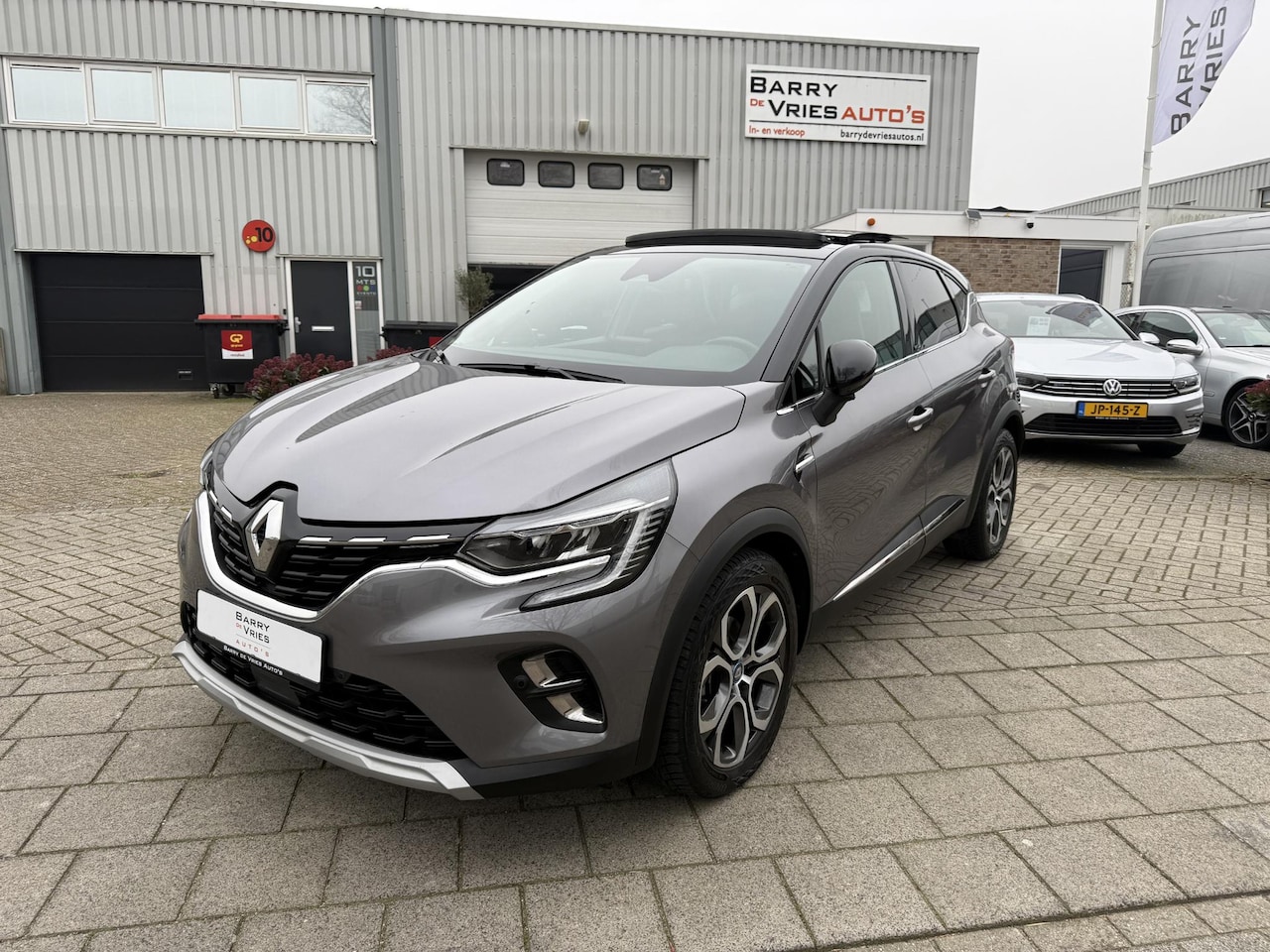 Renault Captur - 1.6 E-Tech Plug-in Hybrid 160 Intens | Schuifdak | Navigatie | Apple Carplay | Stuurwiel v - AutoWereld.nl
