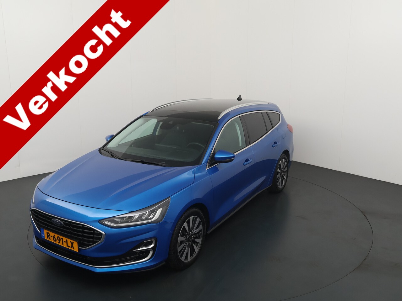 Ford Focus Wagon - 155PK EcoBoost Hybrid Titanium Vignale | Leder | Panorama | Winter pack | Elektr achterkle - AutoWereld.nl