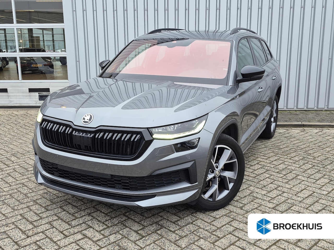 Skoda Kodiaq - 1.5 TSI Sportline Business 7p 150pk DSG/AUTO | Panoramadak Elektrisch | Trekhaak uitklapba - AutoWereld.nl