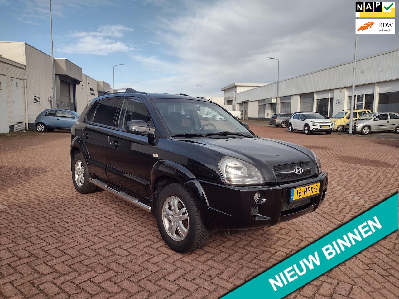 Hyundai Tucson - 2.0i Style Executive MOOIE AUTO BEL 0619590613 HOGEN IN STAP AIRCO 5 DRS - AutoWereld.nl