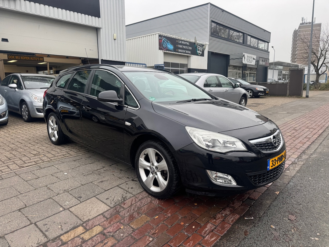 Opel Astra Sports Tourer - 1.4 Turbo Edition 1.4 Turbo Edition - AutoWereld.nl
