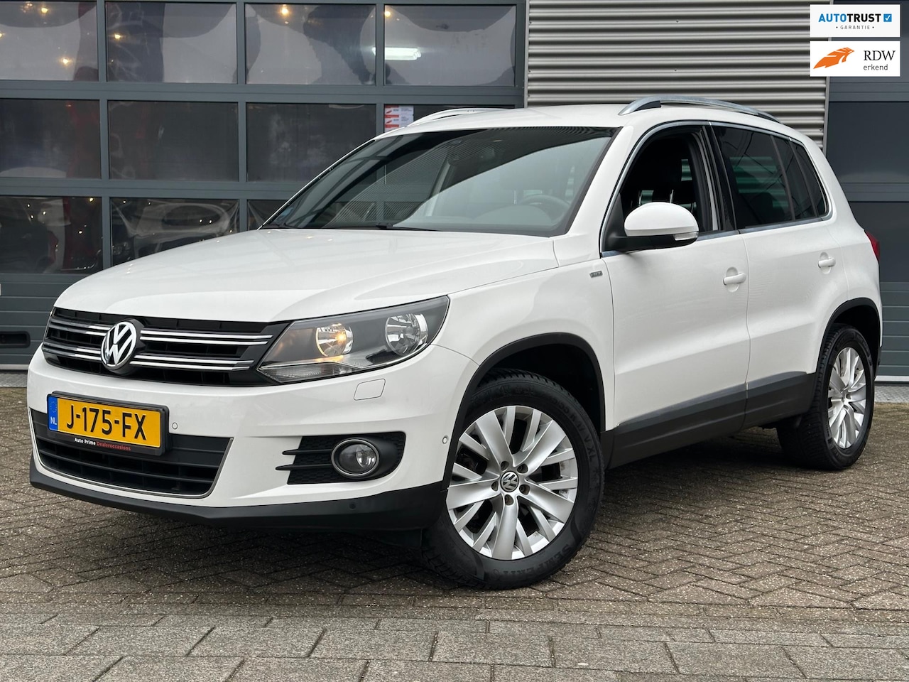 Volkswagen Tiguan - 1.4 TSI Sport&Style | Navi | CRUISECR | PDC | Airco - AutoWereld.nl