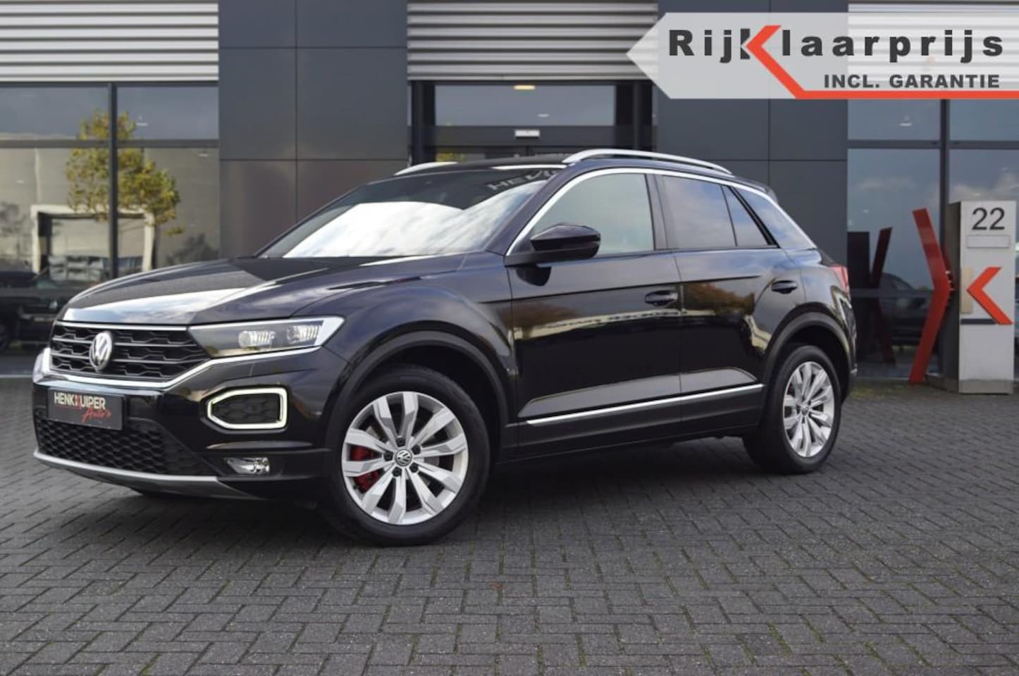 Volkswagen T-Roc - 1.5 TSI DSG Sport 150pk / Trekhaak / Navi / Camera / El. Achterklep /PDC - AutoWereld.nl