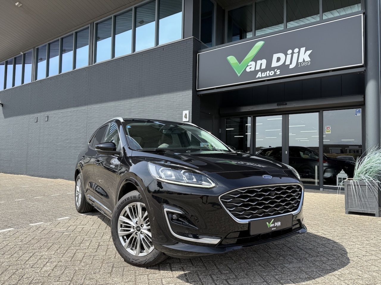 Ford Kuga - 2.5 PHEV Vignale Panodak Navi Camera Leer - AutoWereld.nl
