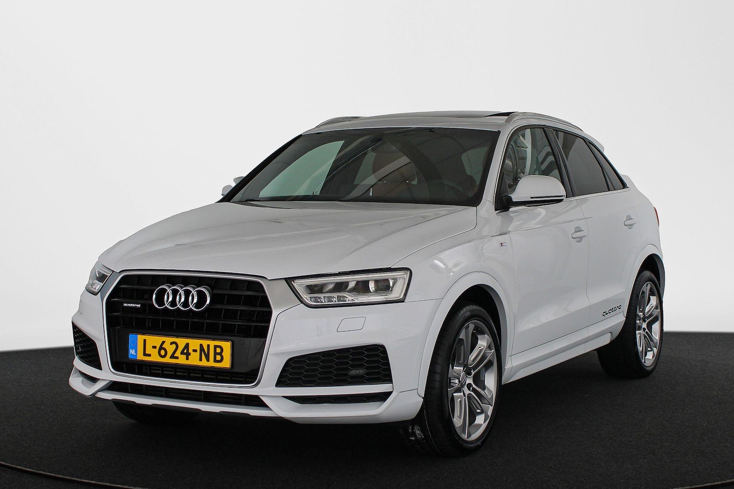 Audi Q3 - 2.0 TFSI quattro Design Pro Line Plus Trekhaak Panoramadak Keyless Camera Stoelverwarming - AutoWereld.nl