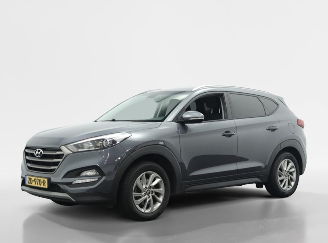 Hyundai Tucson - 1.6 GDi Anniversary Edition | Trekhaak | Navigatie | Camera | Cr - AutoWereld.nl