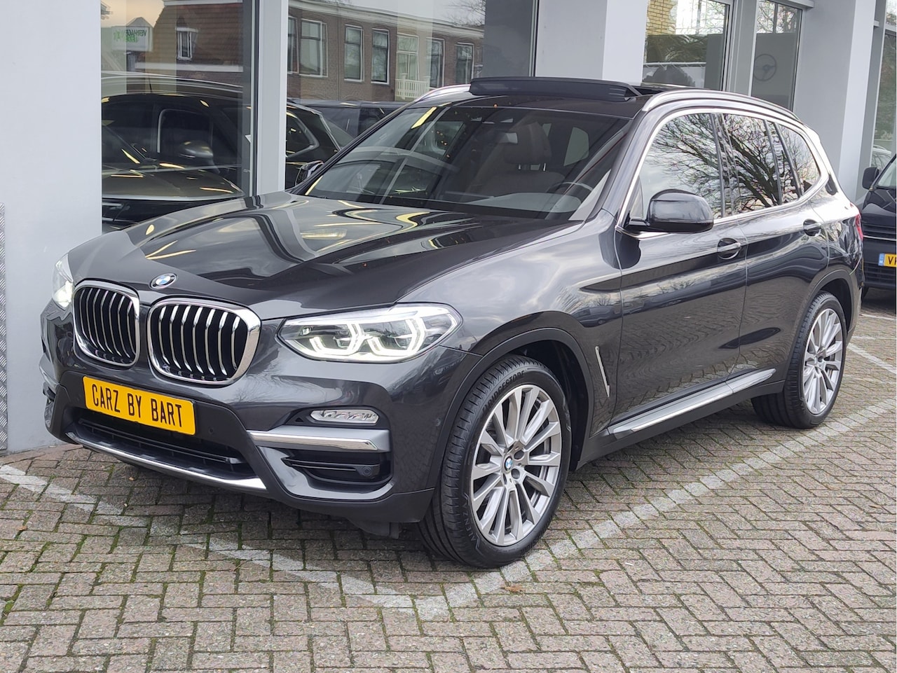 BMW X3 - xDRIVE20i HIGH EXECUTIVE AUTOMAAT Open dak | Bruin leder | Trekhaak | Stoelverwarming - AutoWereld.nl