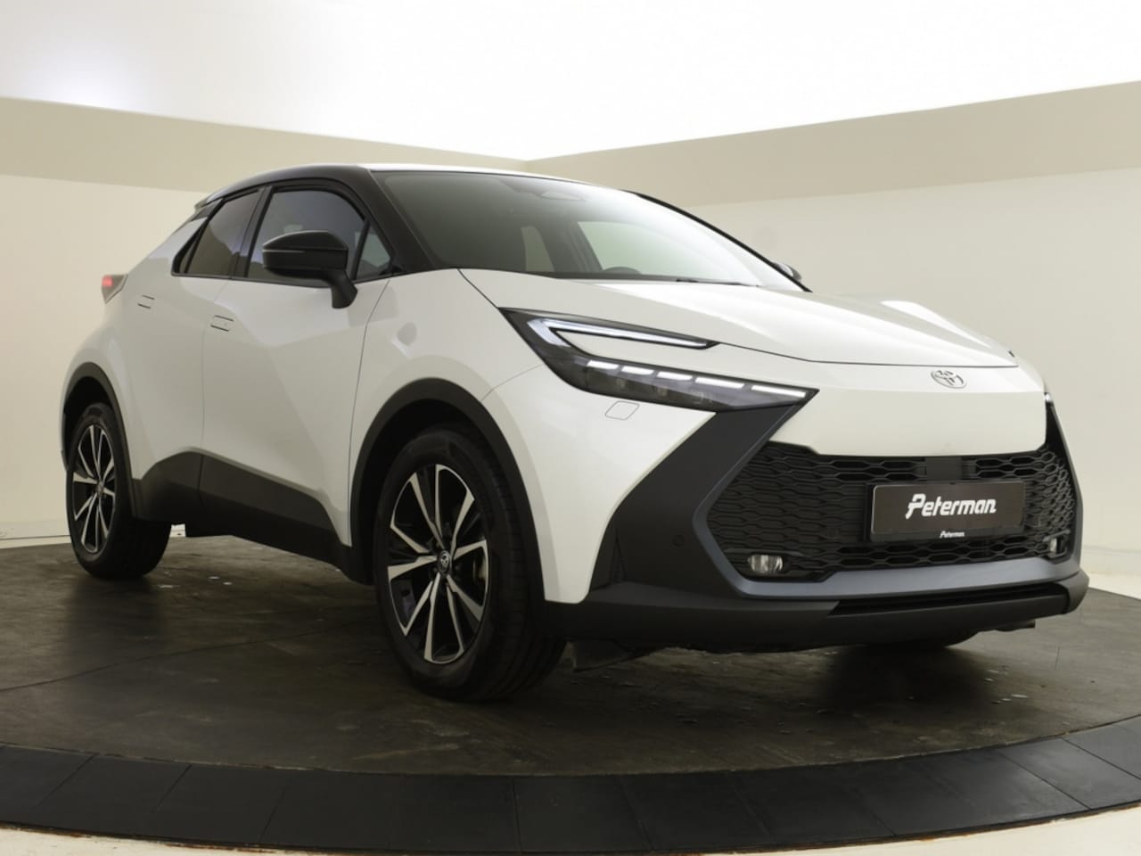 Toyota C-HR - 1.8 Hybrid 140 Style Bi Tone | Elektrische A. Klep | Blindspot - AutoWereld.nl