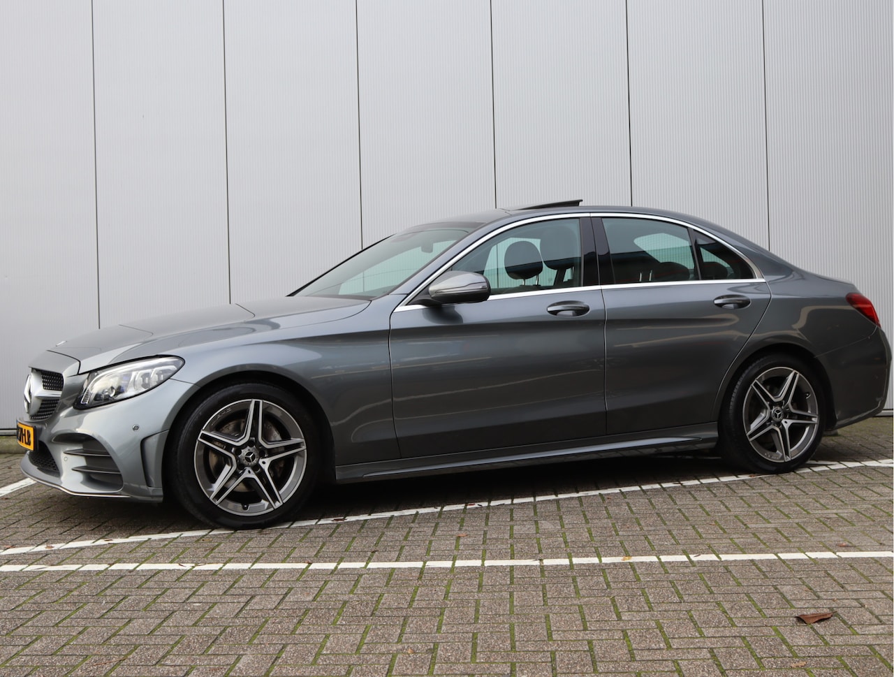 Mercedes-Benz C-klasse - 180 AMG-line | Schuifdak | Sfeerverlichting | Multibeam - AutoWereld.nl