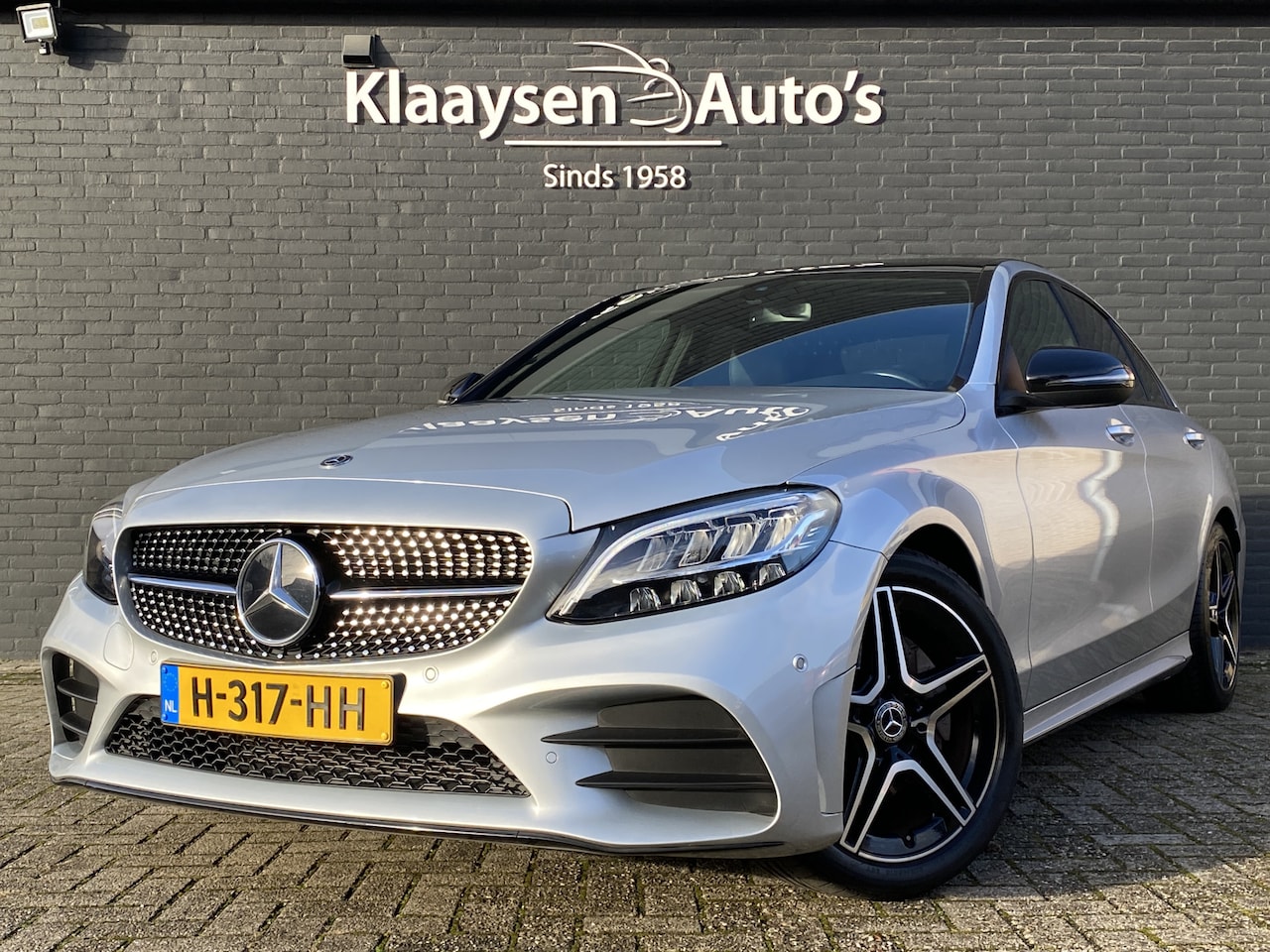 Mercedes-Benz C-klasse - 180 Business Solution AMG AUT. | dealer onderhouden | panoramadak | night pakket | navigat - AutoWereld.nl