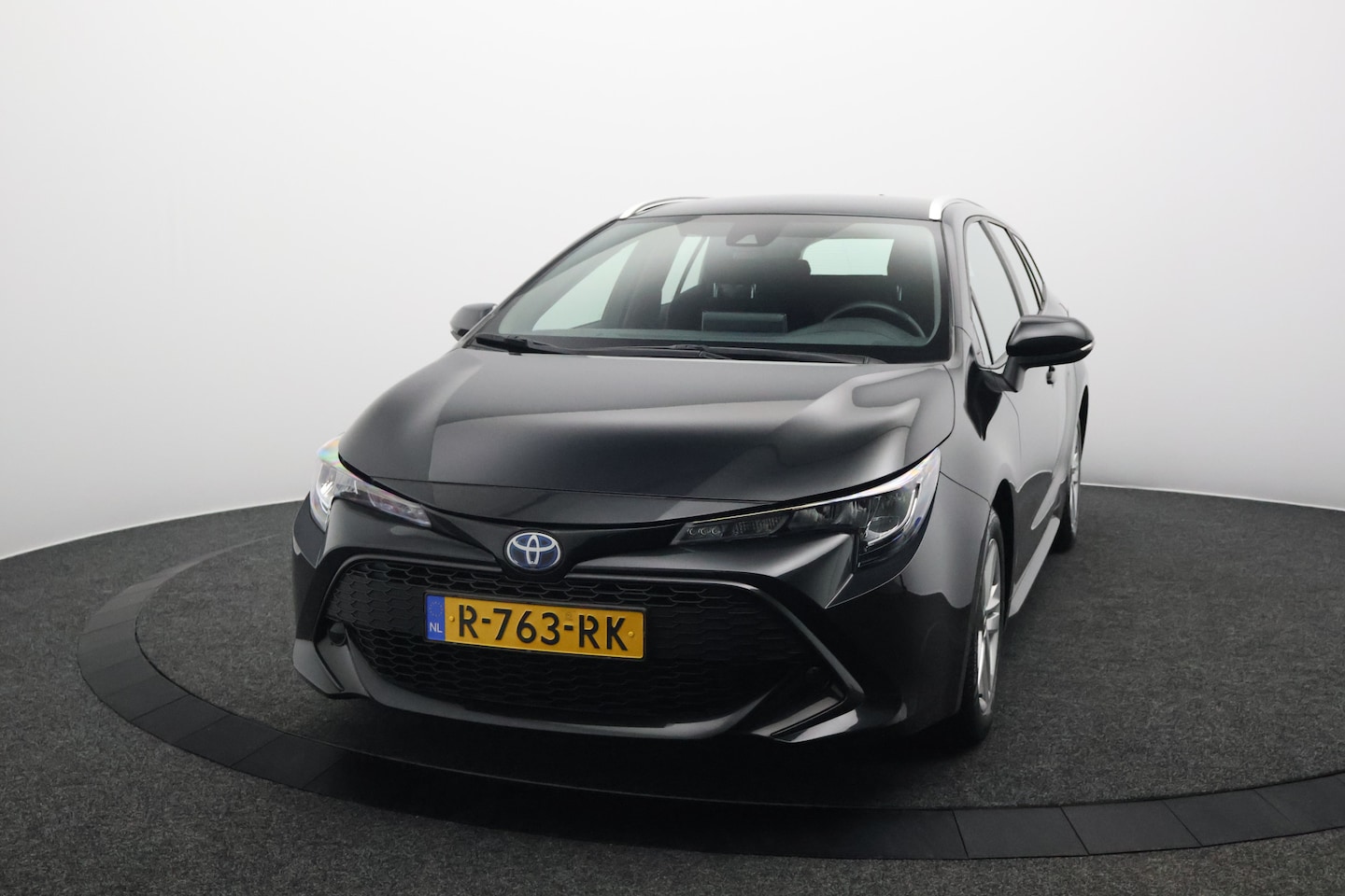 Toyota Corolla Touring Sports - 1.8 Hybrid Active | 35000KM | Camera | Navigatie | Cruise Control Adaptief - AutoWereld.nl